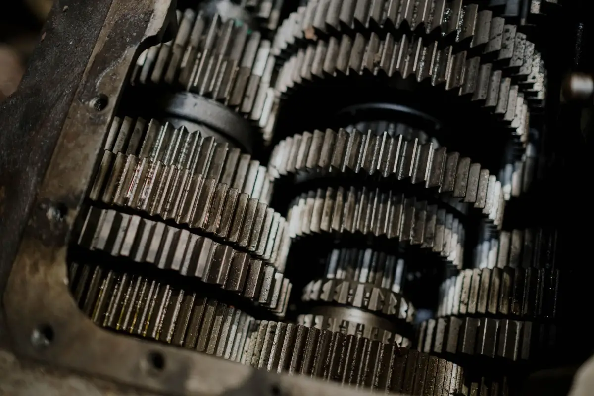 Close-up of the gear cluster inside an opened gate operator gearbox